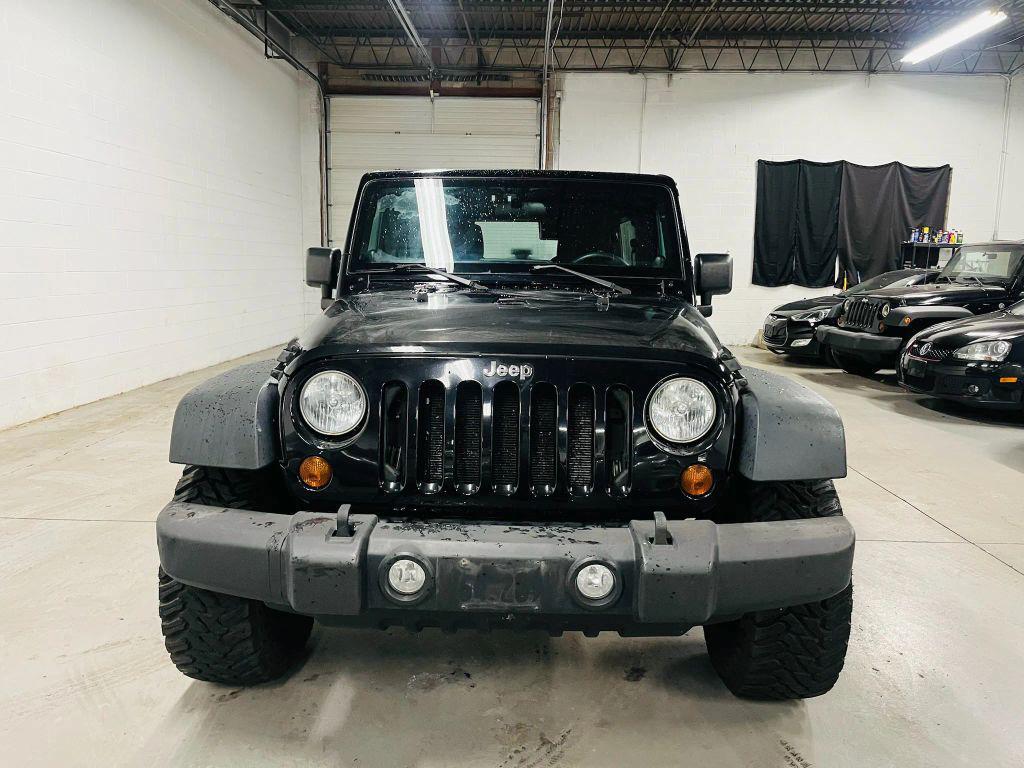 used 2013 Jeep Wrangler Unlimited car, priced at $12,750