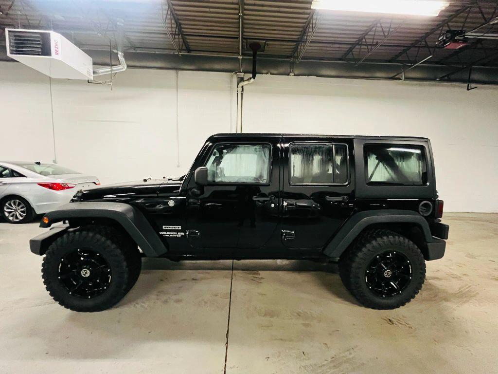 used 2013 Jeep Wrangler Unlimited car, priced at $12,750