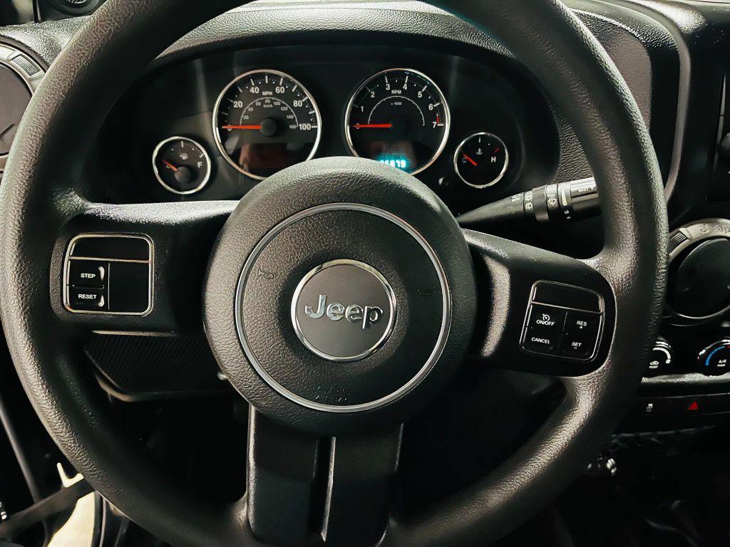 used 2013 Jeep Wrangler Unlimited car, priced at $12,750