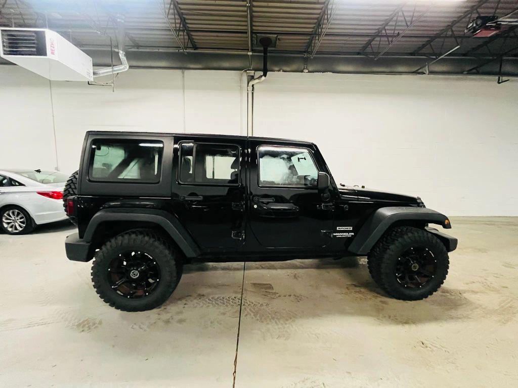used 2013 Jeep Wrangler Unlimited car, priced at $12,750