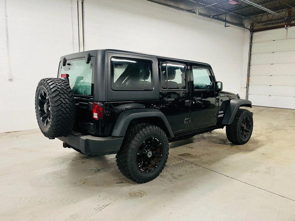 used 2013 Jeep Wrangler Unlimited car, priced at $12,750
