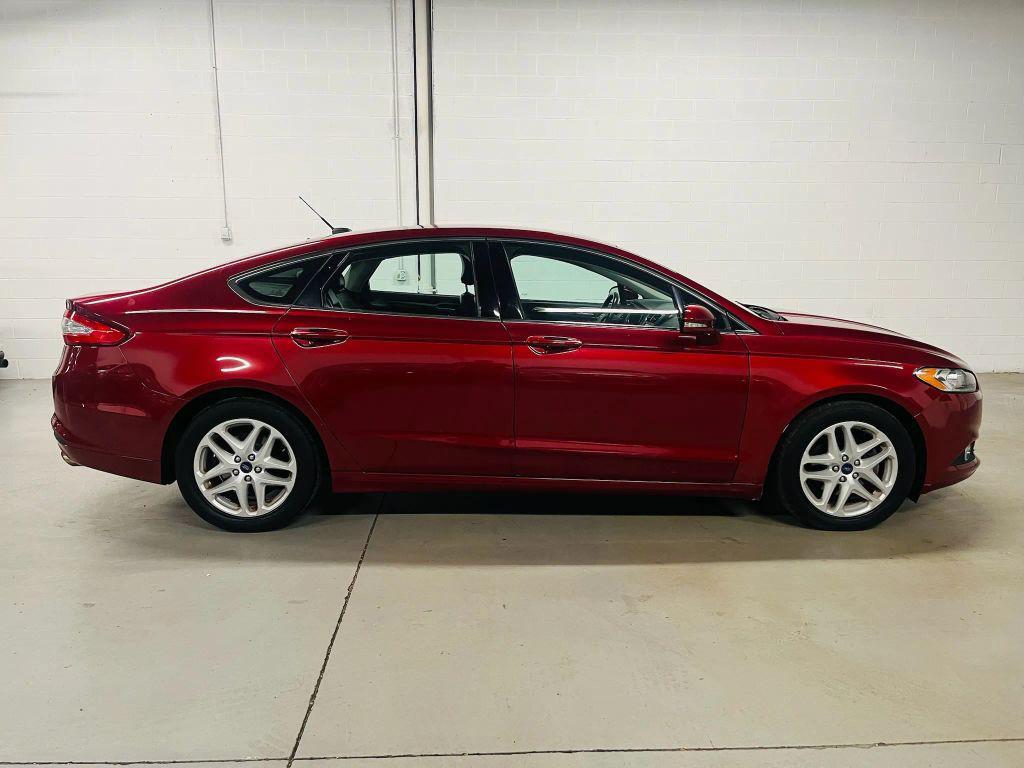 used 2016 Ford Fusion car, priced at $7,500