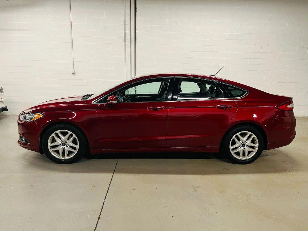 used 2016 Ford Fusion car, priced at $7,500