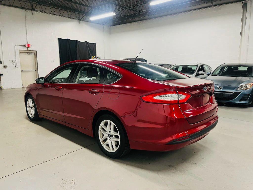 used 2016 Ford Fusion car, priced at $7,500