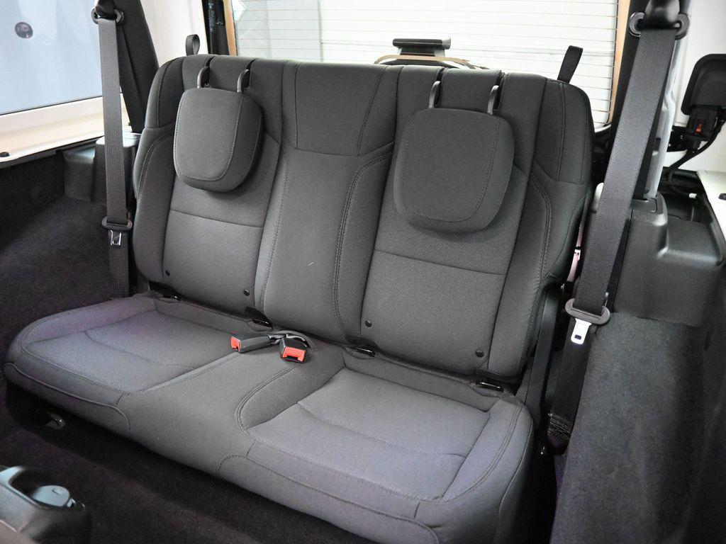 used 2023 Jeep Wrangler car, priced at $28,034