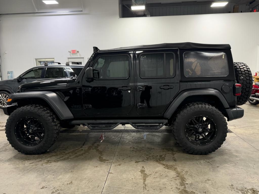 used 2021 Jeep Wrangler Unlimited car, priced at $26,395