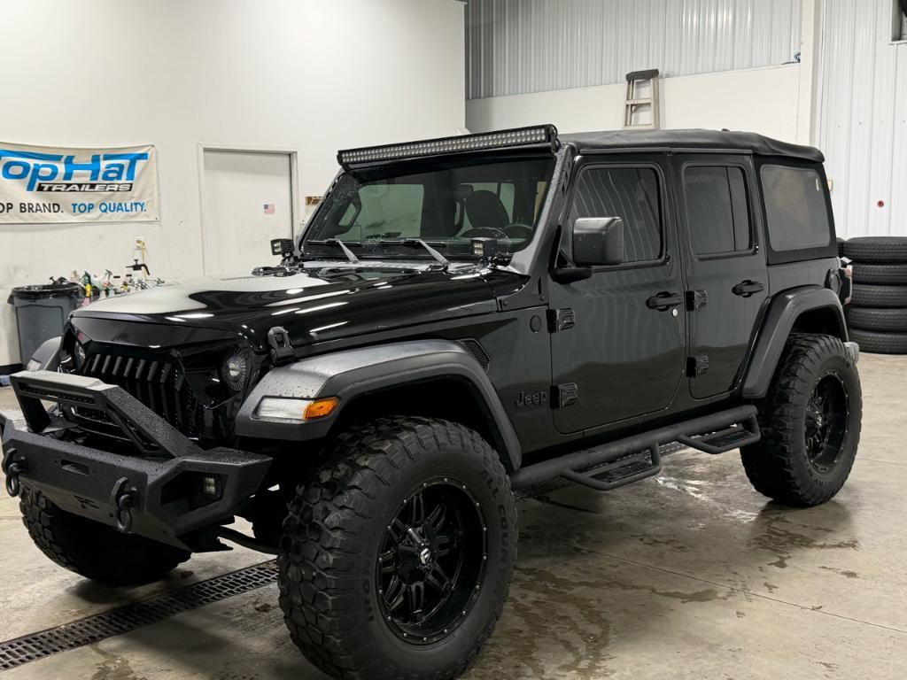 used 2021 Jeep Wrangler Unlimited car, priced at $26,395