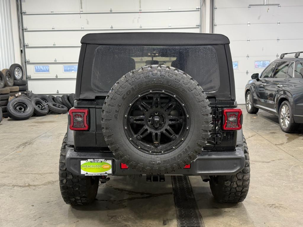 used 2021 Jeep Wrangler Unlimited car, priced at $26,395