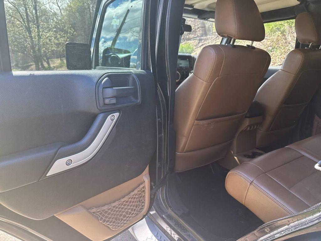 used 2011 Jeep Wrangler Unlimited car, priced at $9,991