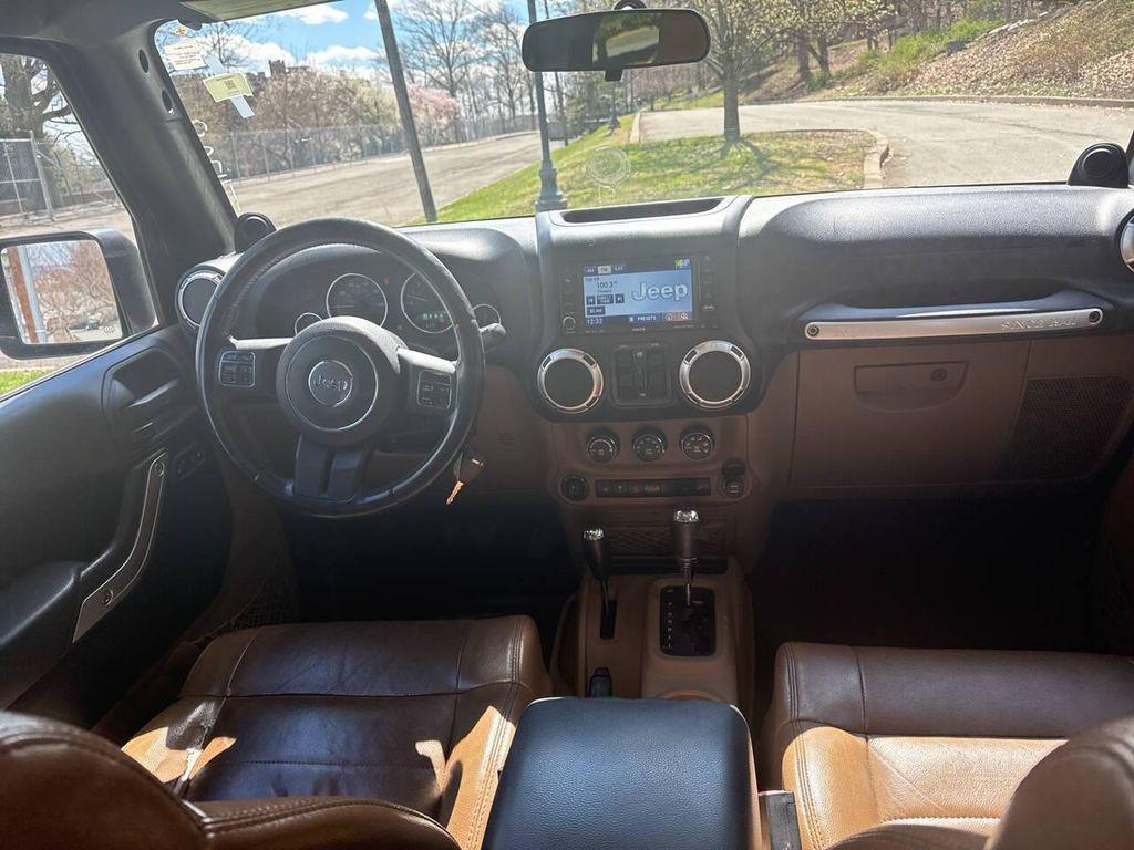 used 2011 Jeep Wrangler Unlimited car, priced at $9,991