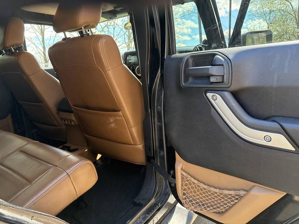 used 2011 Jeep Wrangler Unlimited car, priced at $9,991