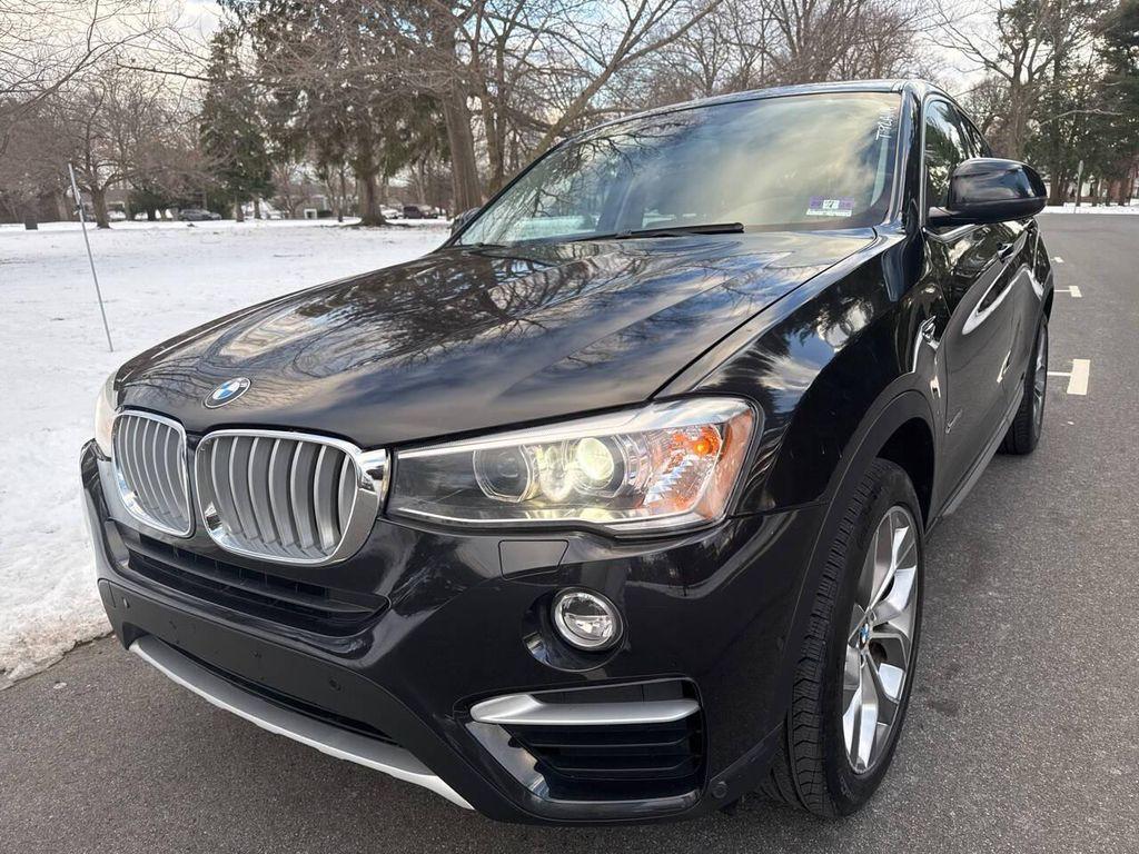 used 2015 BMW X4 car, priced at $11,591