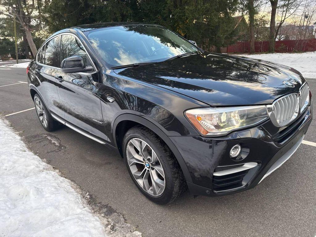 used 2015 BMW X4 car, priced at $11,591