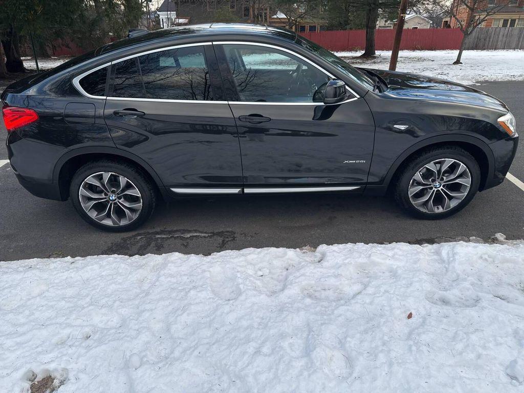 used 2015 BMW X4 car, priced at $11,591