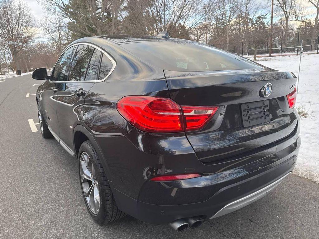 used 2015 BMW X4 car, priced at $11,591