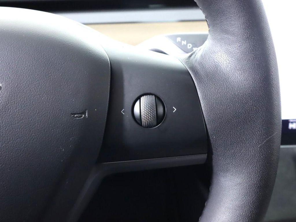 used 2023 Tesla Model 3 car, priced at $27,995