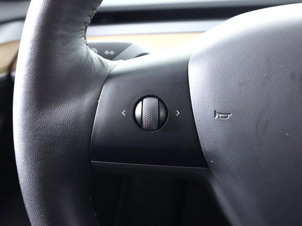 used 2023 Tesla Model 3 car, priced at $27,995