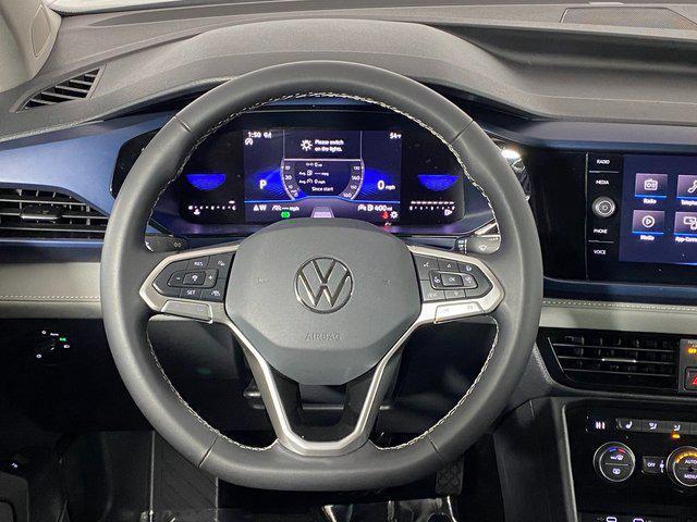 used 2024 Volkswagen Taos car, priced at $20,795