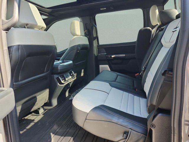 new 2025 Ford F-150 Lightning car, priced at $74,273