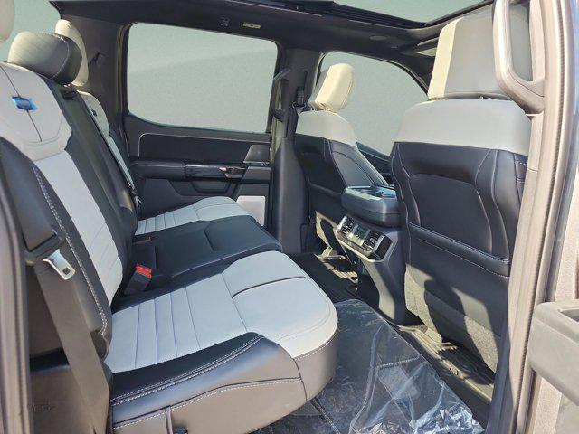 new 2025 Ford F-150 Lightning car, priced at $74,273