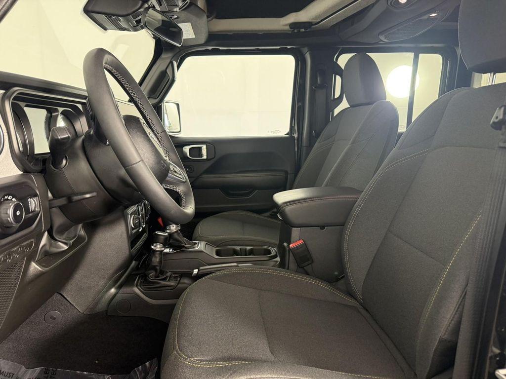 used 2025 Jeep Wrangler car, priced at $34,998