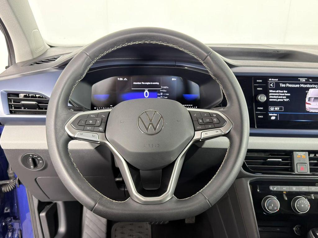 used 2023 Volkswagen Taos car, priced at $21,998