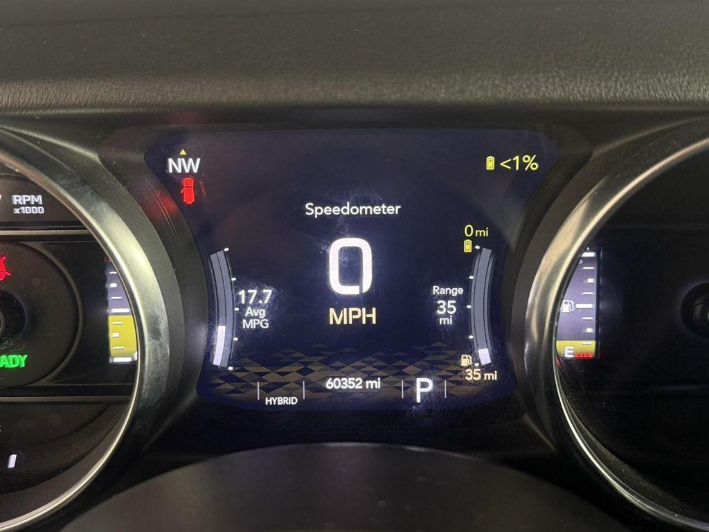 used 2023 Jeep Wrangler 4xe car, priced at $25,998