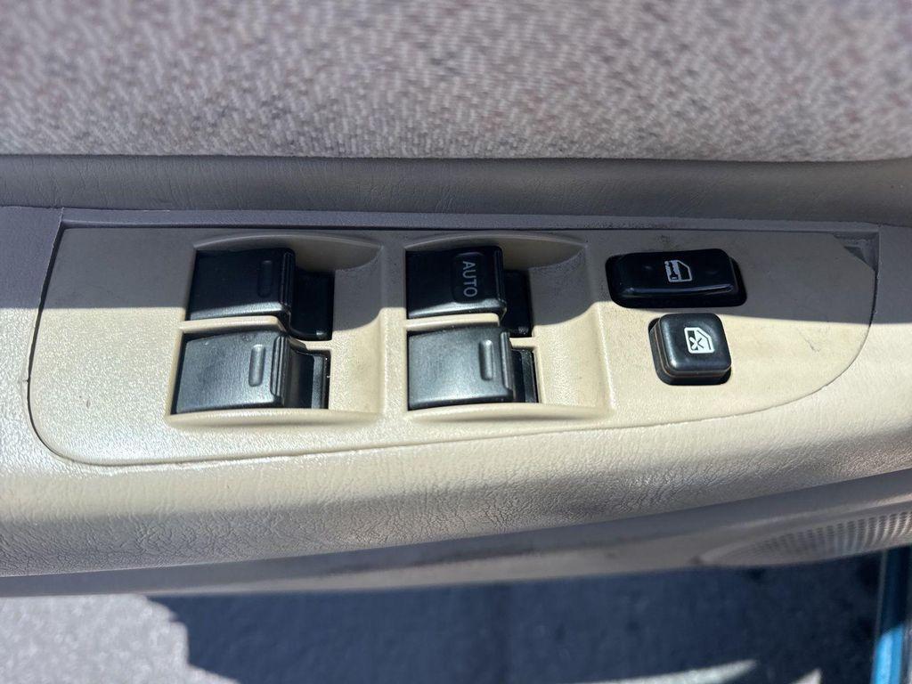 used 1999 Toyota Corolla car, priced at $6,990