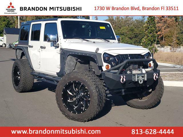 used 2013 Jeep Wrangler Unlimited car, priced at $14,555