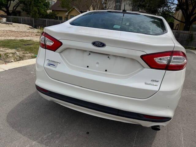 used 2014 Ford Fusion car, priced at $7,999
