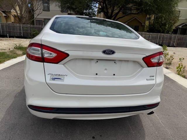 used 2014 Ford Fusion car, priced at $7,999