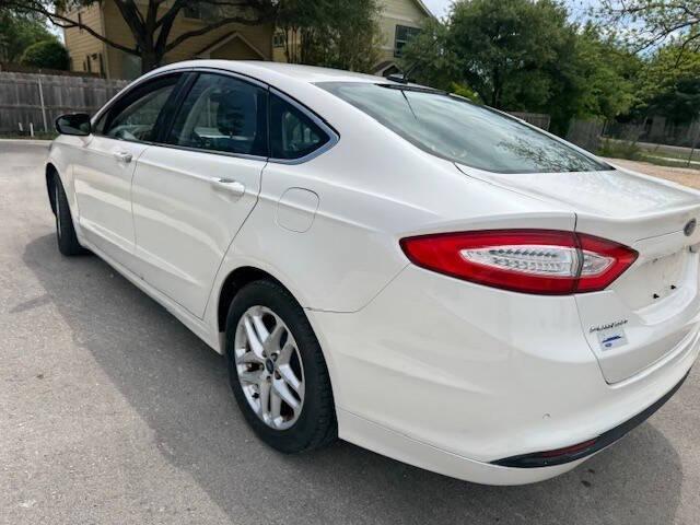 used 2014 Ford Fusion car, priced at $7,999