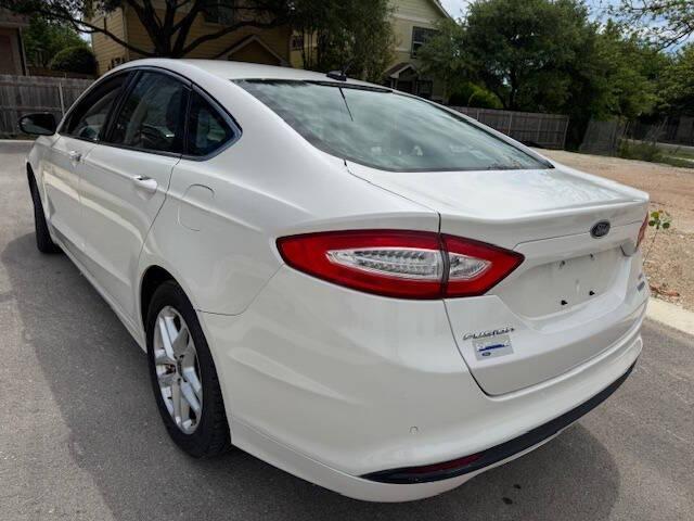 used 2014 Ford Fusion car, priced at $7,999