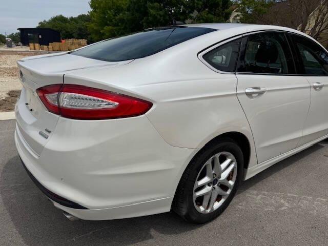 used 2014 Ford Fusion car, priced at $7,999