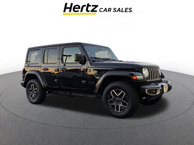 used 2025 Jeep Wrangler car, priced at $33,657