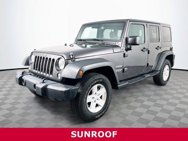 used 2017 Jeep Wrangler Unlimited car, priced at $20,473