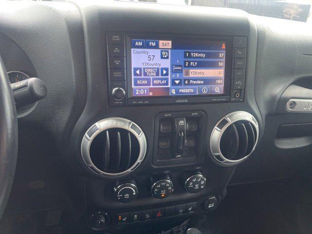 used 2015 Jeep Wrangler Unlimited car, priced at $15,117