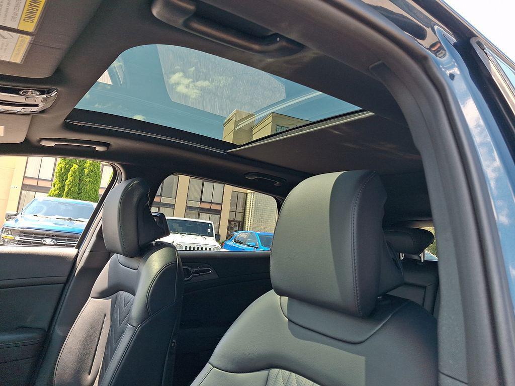 used 2024 Kia Sportage Plug-In Hybrid car, priced at $34,299