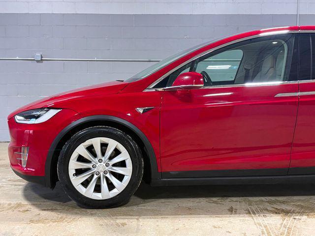 used 2018 Tesla Model X car, priced at $27,880