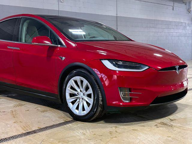 used 2018 Tesla Model X car, priced at $27,880