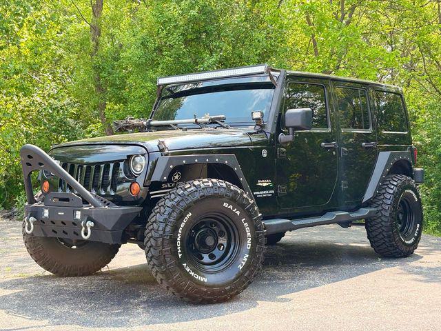 used 2013 Jeep Wrangler Unlimited car, priced at $16,480