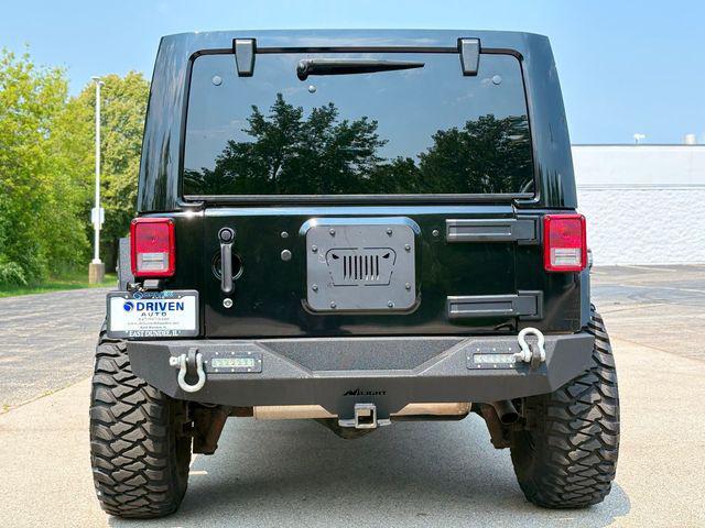 used 2013 Jeep Wrangler Unlimited car, priced at $15,480