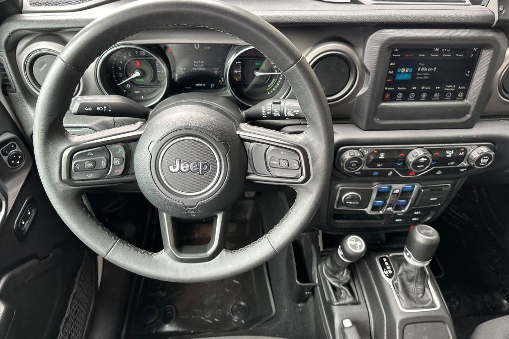 used 2023 Jeep Wrangler 4xe car, priced at $24,788