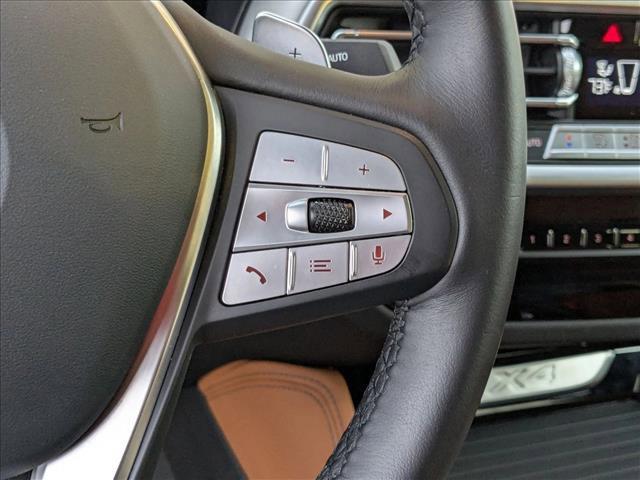 used 2025 BMW X4 car, priced at $47,560