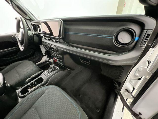 used 2024 Jeep Wrangler 4xe car, priced at $43,387