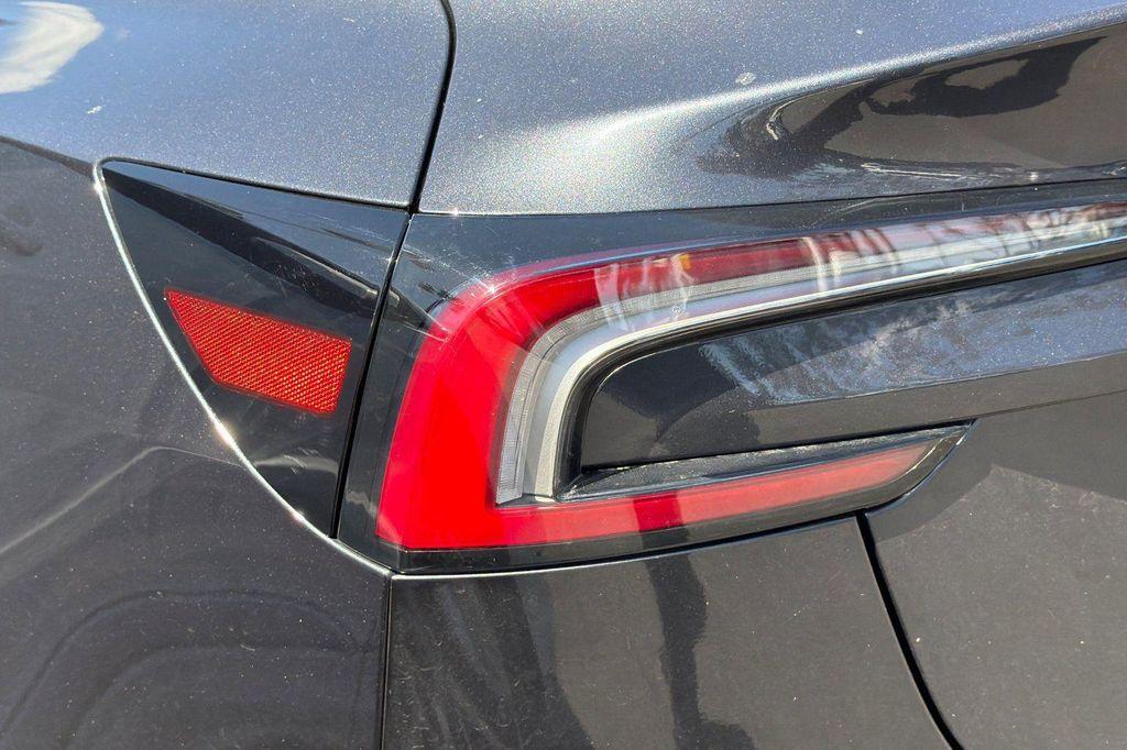 used 2025 Tesla Model 3 car, priced at $40,854