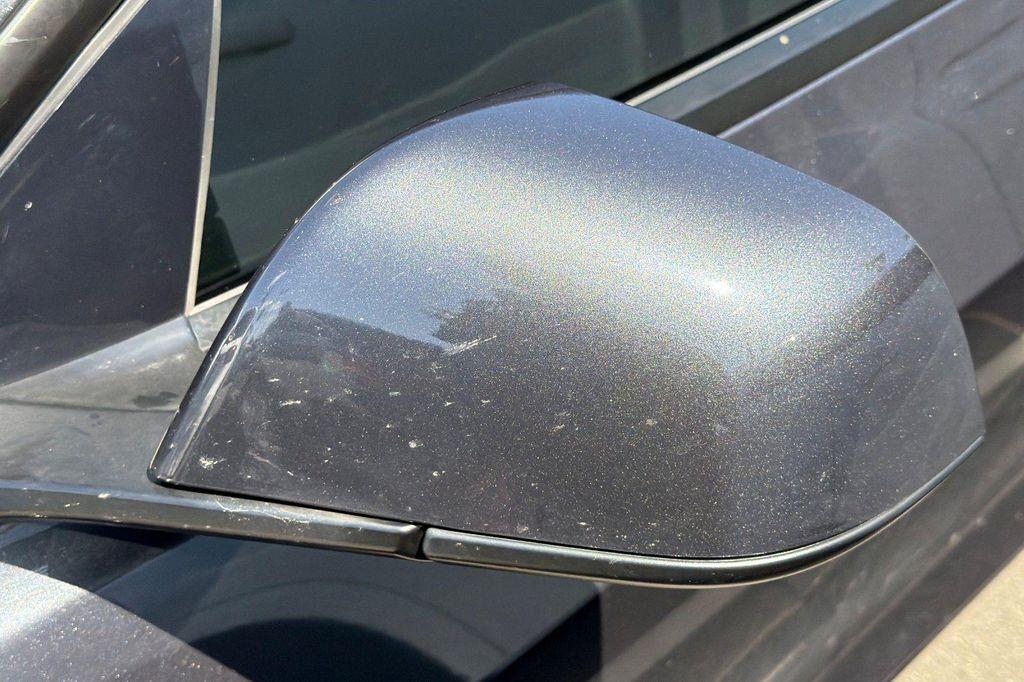 used 2025 Tesla Model 3 car, priced at $40,854