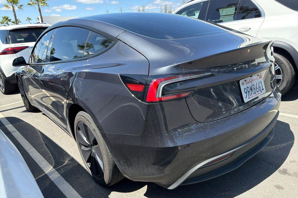 used 2025 Tesla Model 3 car, priced at $40,854