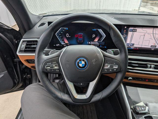 used 2023 BMW 330e car, priced at $30,906
