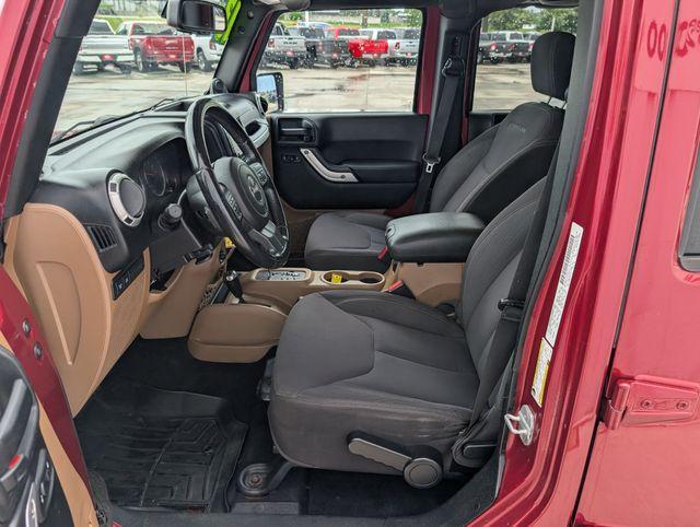 used 2013 Jeep Wrangler Unlimited car, priced at $18,609